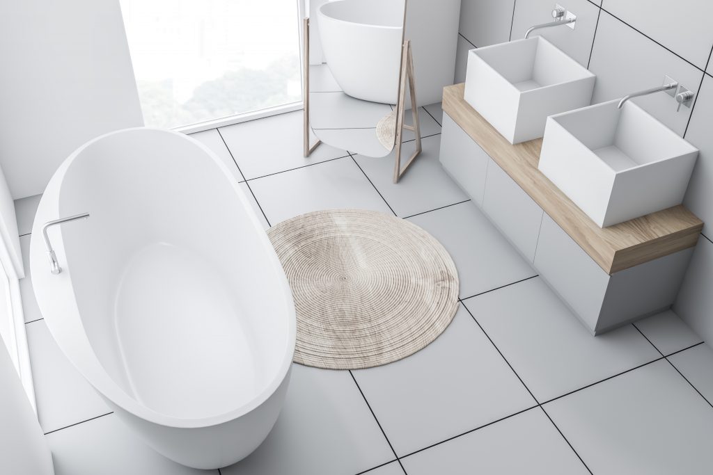 clean modern bathroom with large floor tiles